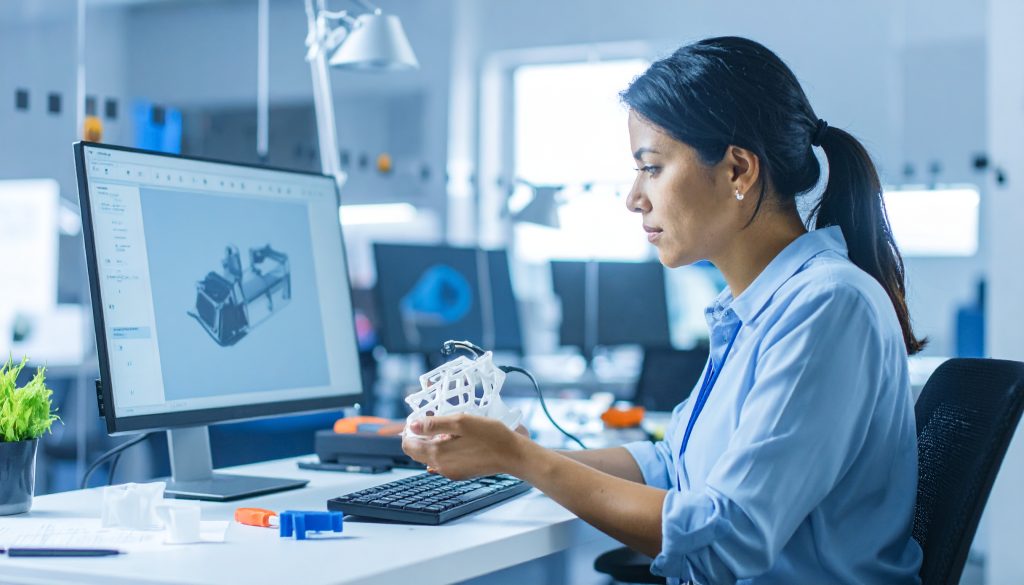 engineer prototyping a smart gadget in a workshop