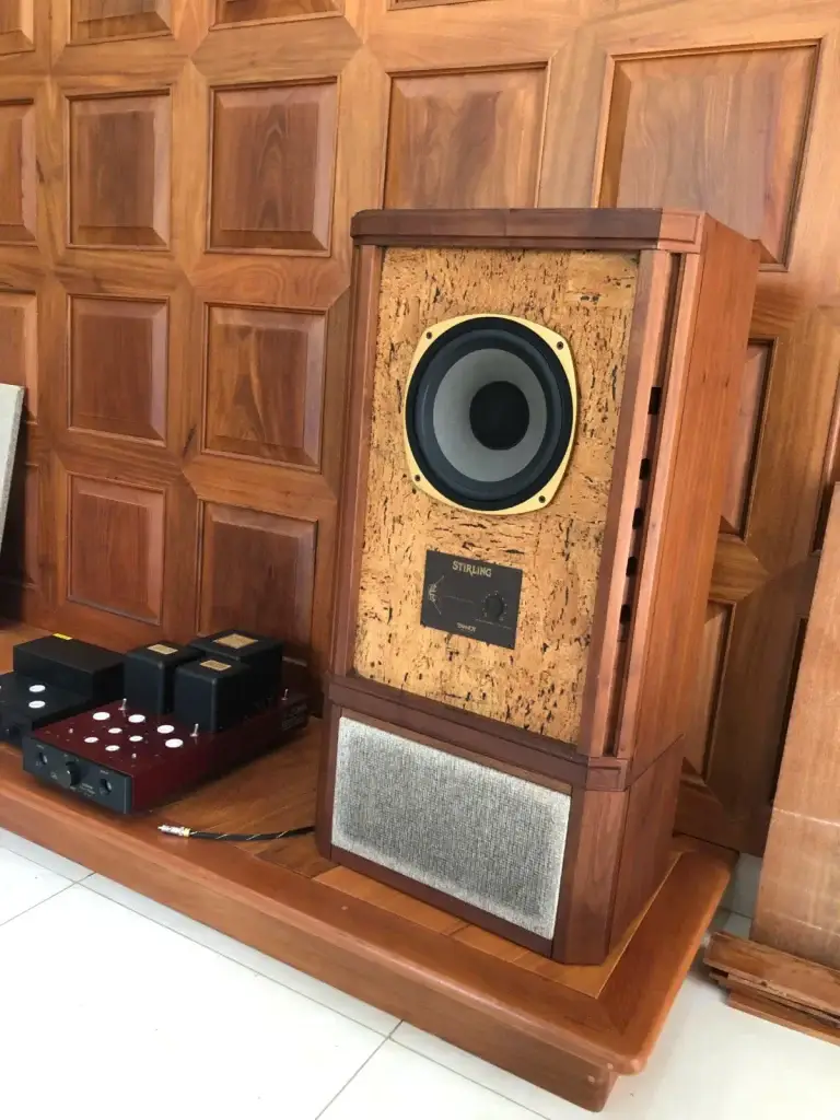 Solid walnut speaker cabinet with precision dovetail joinery and hand finish