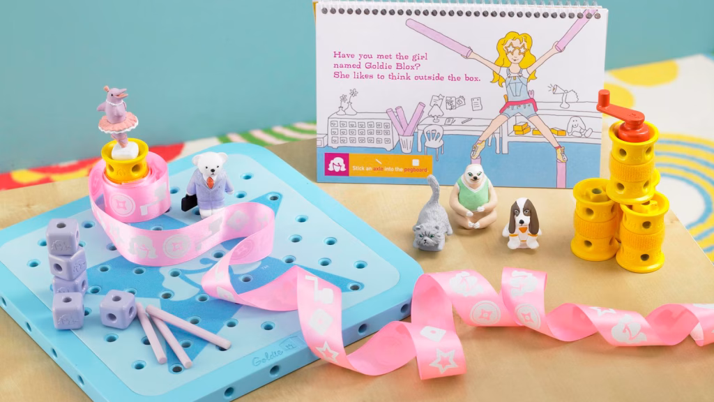 GoldieBlox — a hand built prototype of wood, thread spools, and clay